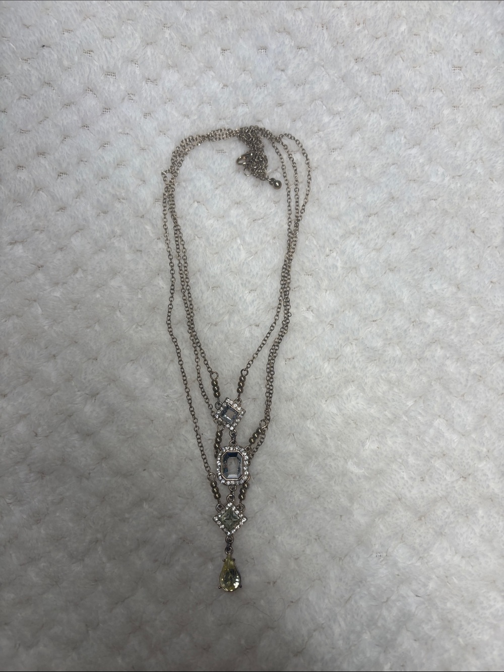 Elegant Multi-Layer Silver Necklace with Clear and Yellow Gem Accents